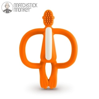 Pomarańczowy gryzak masujący ze szczoteczką Matchstick Monkey