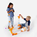 Dziewczynka i chłopiec bawią się kulodromem Fat Brain Toys Dziewczynka i chłopiec bawią się kulodromem Fat Brain Toys