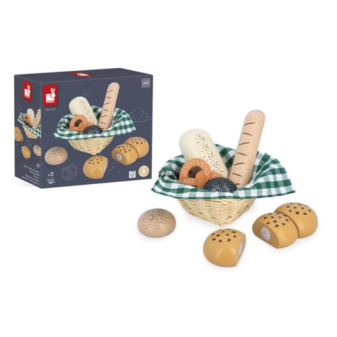 Koszyk z drewniamym pieczywem Janod przy opakowaniu