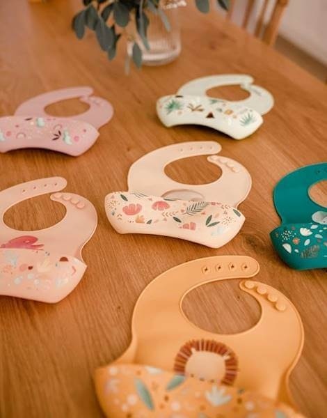 Zielony Śliniak Silikonowy z kieszonką SASSI Dinozaur  różne kolory