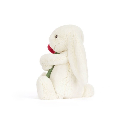 Kremowy króliczek Jellycat z różą bok
