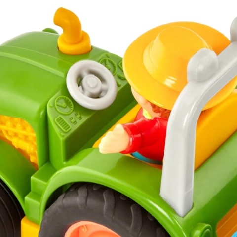 Traktor z przyczepą, rolnikiem i zwierzętami