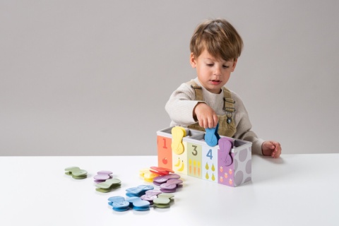 Zabawka edukacyjna z klipsami Taf Toys Królicza zabawa rozwojowa