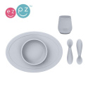 EZPZ Komplet pierwszych naczyń silikonowych First Foods Set pastelowa szarość EZPZ Komplet pierwszych naczyń silikonowych First Foods Set pastelowa szarość